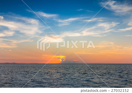 Sunset over seacoast skyline 27032152