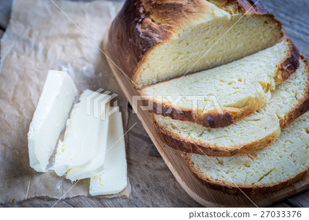 Brioche bread on the wooden board 27033376