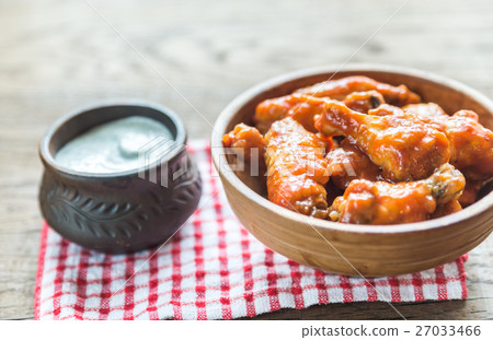 Bowl of buffalo chicken wings Bowl of buffalo chicken wings 27033466