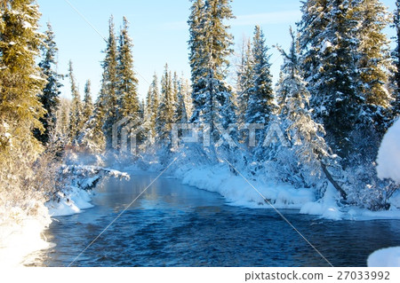 Beautiful winter sunset on the river in Russia 27033992
