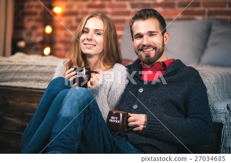 Young couple at home Young couple at home 27034685