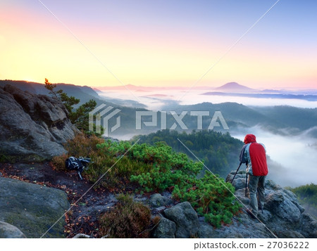 Photographer takes photos. Fall fogy landscape Photographer takes photos. Fall fogy landscape 27036222