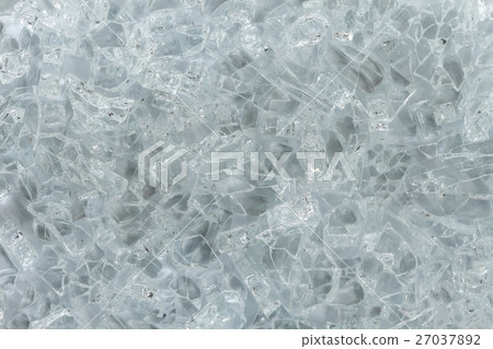 Pieces of broken glass background. 27037892