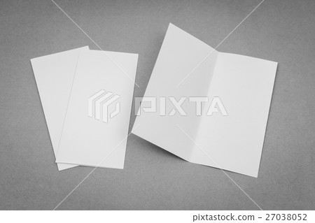 Bifold white template paper on gray background . 27038052