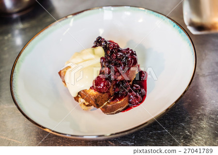 french toast with berry and sauce sabayon 27041789