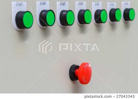 Red emergency stop switch with start buttons. 27043343