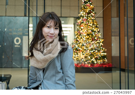 Christmas tree illumination and female 27043997