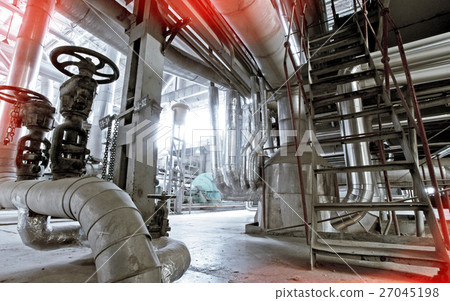 Steel pipelines and cables in blue tones 27045198