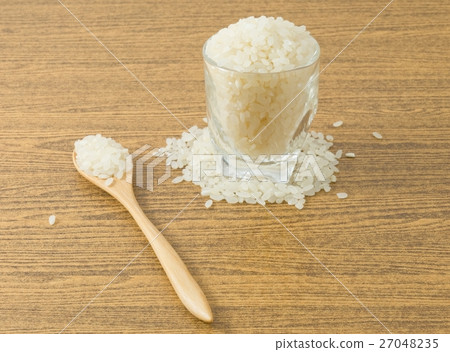 Japanese Rice in A Wooden Spoon and Glass Cup Japanese Rice in A Wooden Spoon and Glass Cup 27048235