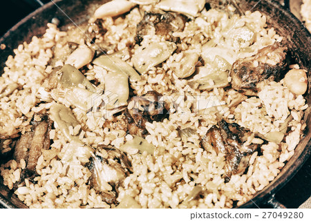Traditional Valencian Paella With Rice And Chicken 27049280