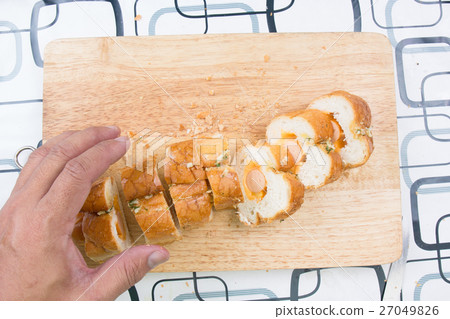 Chef slicing bread Chef slicing bread 27049826