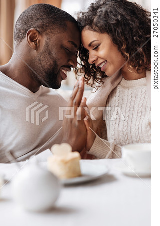 Soulful smiling African American couple touching Soulful smiling African American couple touching 27050341