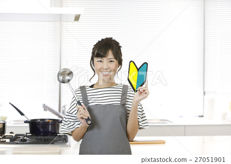 A woman going to a cooking class A woman going to a cooking class 27051901