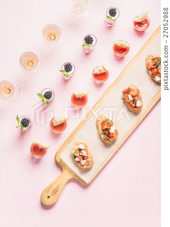 Snacks, brushetta sandwiches, gazpacho shots 27052988