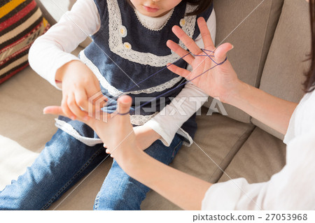 Mother girl playing with aya 27053968