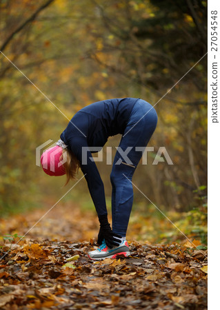 Young woman engaged in sports Young woman engaged in sports 27054548