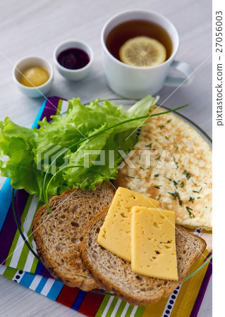 Breakfast with scrambled eggs on a transparent Breakfast with scrambled eggs on a transparent 27056003