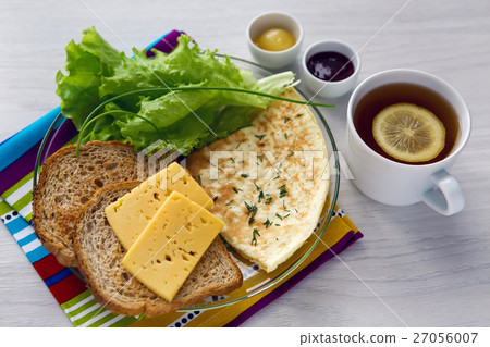 Breakfast with scrambled eggs on a transparent Breakfast with scrambled eggs on a transparent 27056007