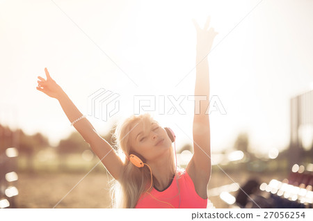 Success fitness winning woman concept with Success fitness winning woman concept with 27056254