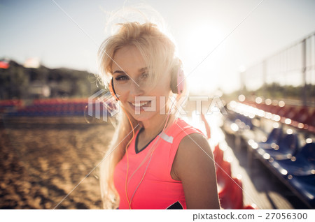 sport outdoor photo of beautiful young blonde 27056300