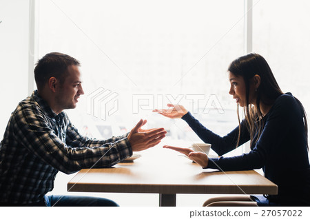 Scene in cafe - couple conflict arguing during the 27057022