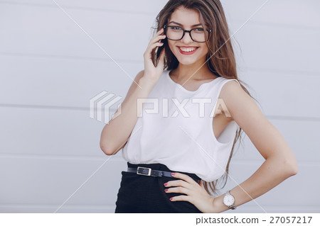 beautiful brunette with glasses 27057217