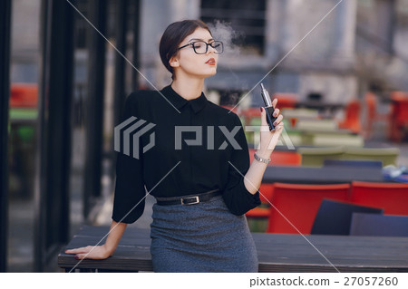 beautiful brunette with glasses 27057260