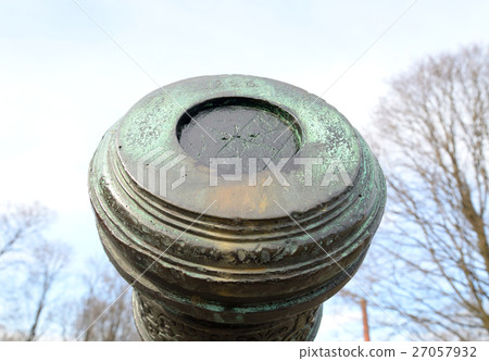 The muzzle of the old cannon. 27057932
