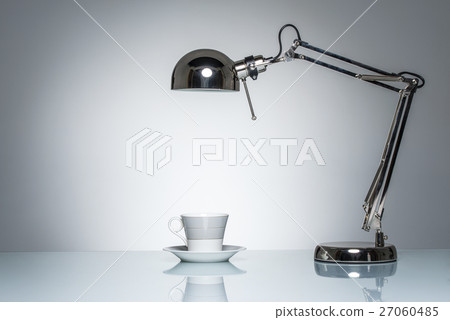 lighting up white mug coffee cup with desk lamp lighting up white mug coffee cup with desk lamp 27060485