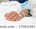 Focus on the hand of a patient in hospital ward 27062483