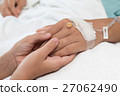 Child holding a Patient  his Mother's hand. 27062490