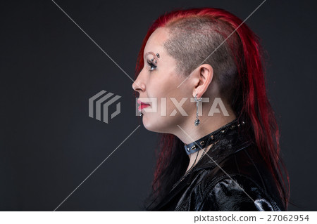 Punk woman in leather jacket, profile 27062954