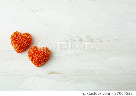 Hearts of roses on a white wooden background Hearts of roses on a white wooden background 27064522