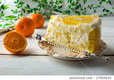 Slice of delicious white jelly fruit tart 27064639