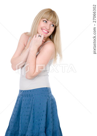 Cheerful blonde with a hand on a chin 27066302