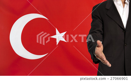 Open hand and Turkey flag in the background Open hand and Turkey flag in the background 27066901