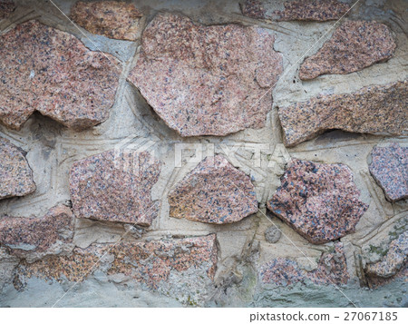 Background of natural rough stone wall texture Background of natural rough stone wall texture 27067185