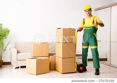 Man delivering boxes during house move Man delivering boxes during house move 27070108
