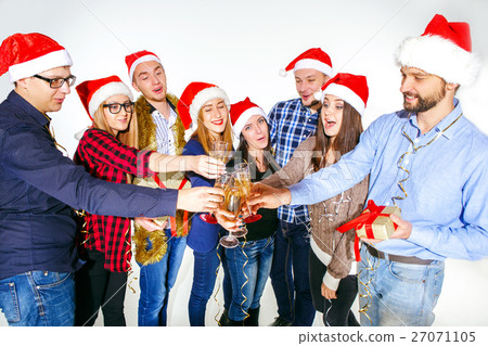 Many young women and men drinking at christmas 27071105