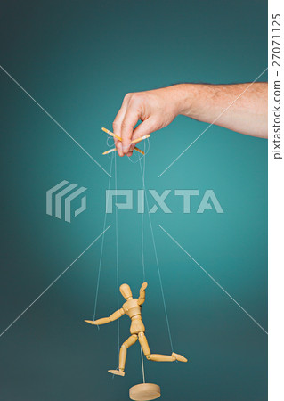 Image puppet in the hands of the puppeteer 27071125