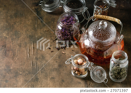 Variety of dry tea with teapot 27071397