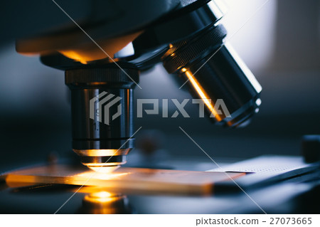 Close up of microscope and test sample Close up of microscope and test sample 27073665