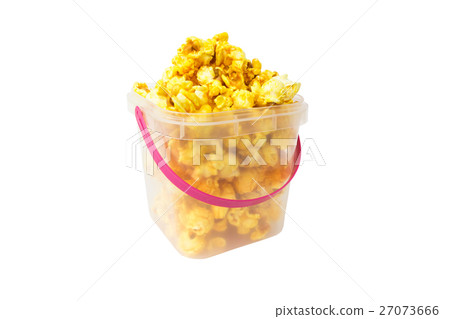 Popcorn in plastic bucket on white background Popcorn in plastic bucket on white background 27073666