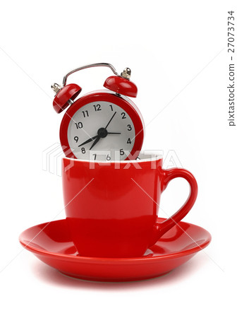Red alarm clock in coffee cup over white Red alarm clock in coffee cup over white 27073734