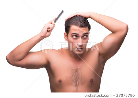 Man brushing his hair isolated on white 27075790