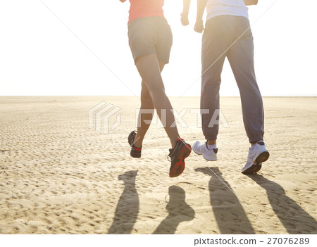 Couple jogging outside. Close up Couple jogging outside. Close up 27076289