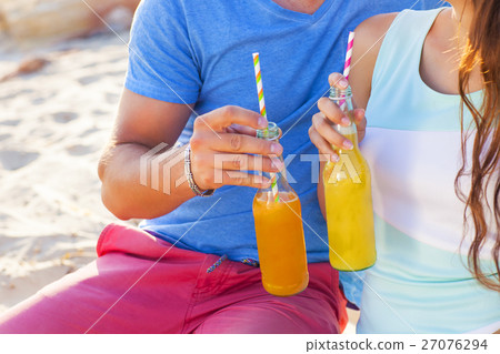 Young happy couple in love at the summer picnic 27076294