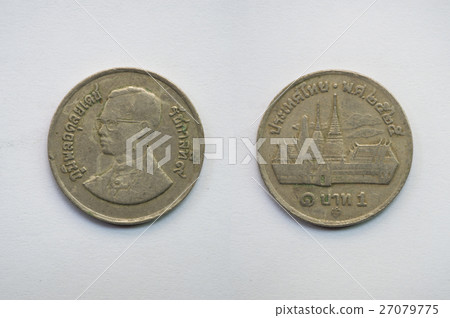 Old Thai coin on white background Old Thai coin on white background 27079775