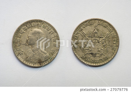 Old Thai coin on white background Old Thai coin on white background 27079776