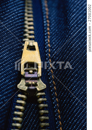 Close up metal zipper openning on blue jean. Close up metal zipper openning on blue jean. 27081002
